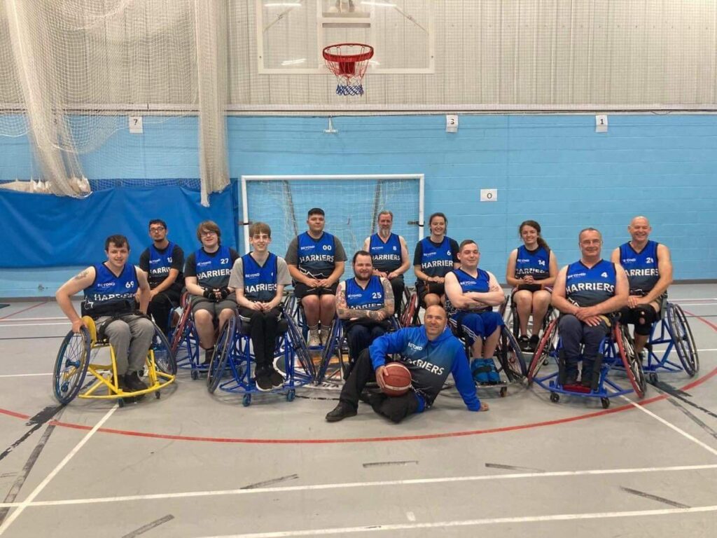 Hampshire Harriers posing for a photo after an intense training session. 
