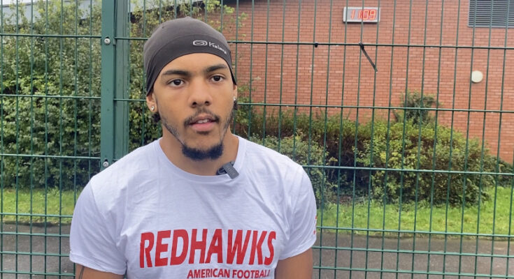 Solent Redhawks running back Nick Williams standing in front of a fence at Test Park.