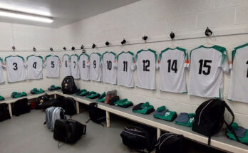 bashley fc changing room green and white tops bags on benches some kit folded up top numbers 1-16