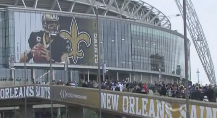 Wembley Stadium decorated with New Orleans Saints banners for London games.