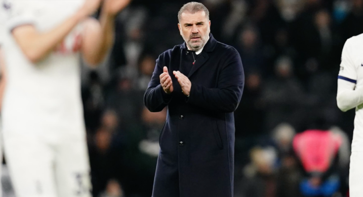 Ange Postecoglou claps the home fans after the Aston Villa game.