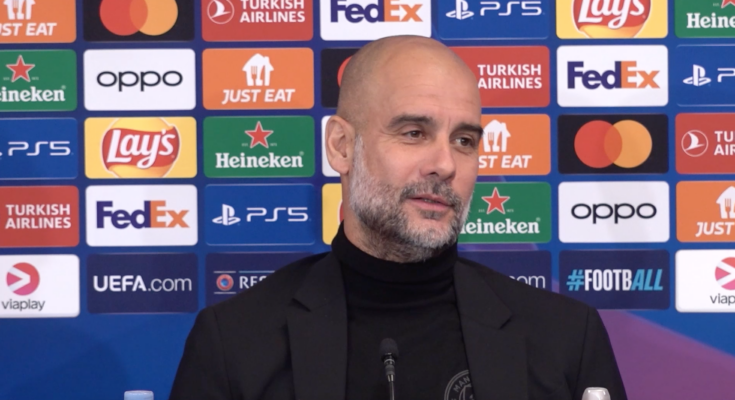 Manchester City manager Pep Guardiola, in the middle of a press conference