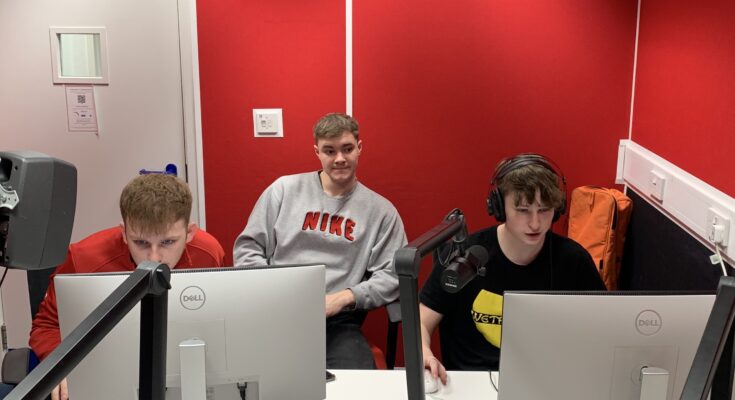Radio team working hard ahead of the second bulletin of the day