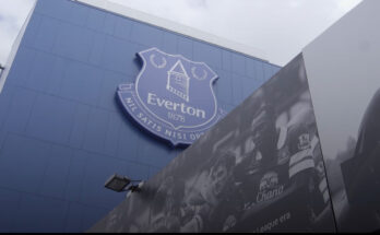 A large image of the Everton badge situated on the side of on one of their stands