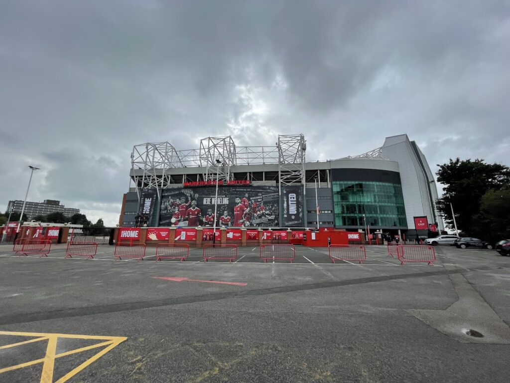 old trafford under grey clouds