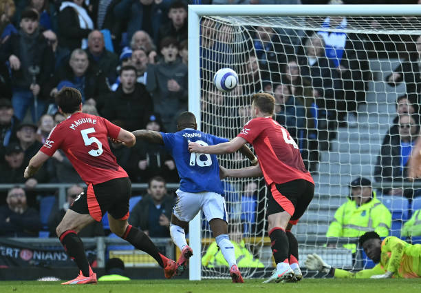 Manchester United's Dutch defender Matthijs de Ligt fouls Everton's English defender Ashley Young during the English Premier League football match...