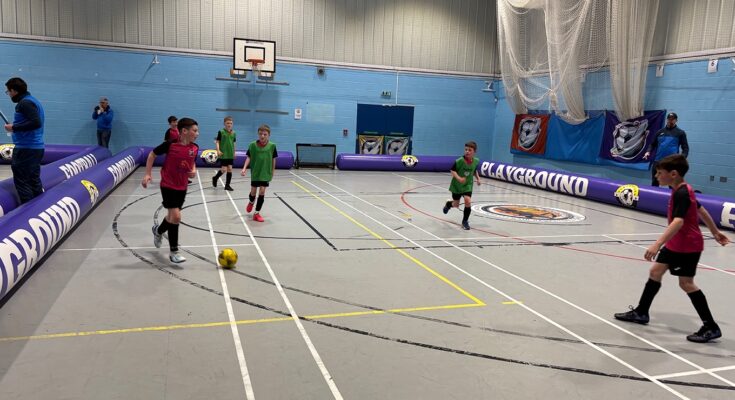 Children playing at Matt Beckingham's 'Playground Football' tournament in February, 2025.
