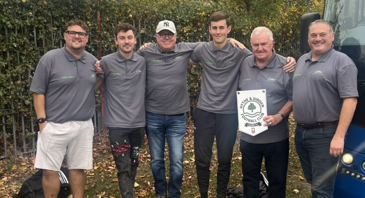 Hythe & Dibden committee members stood outside a coach