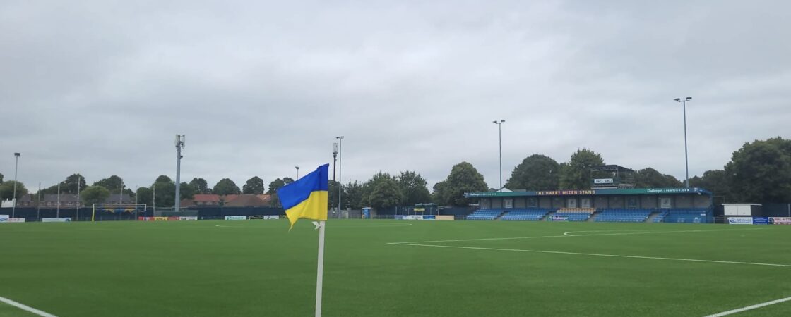 A corner flag blown in the wind at the AEI Stadium.