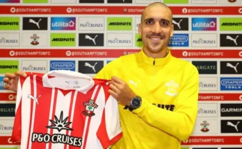 Southampton player Oriol Romeu holds up Southampton shirt