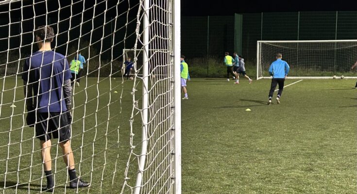 A view behind a goal at football training