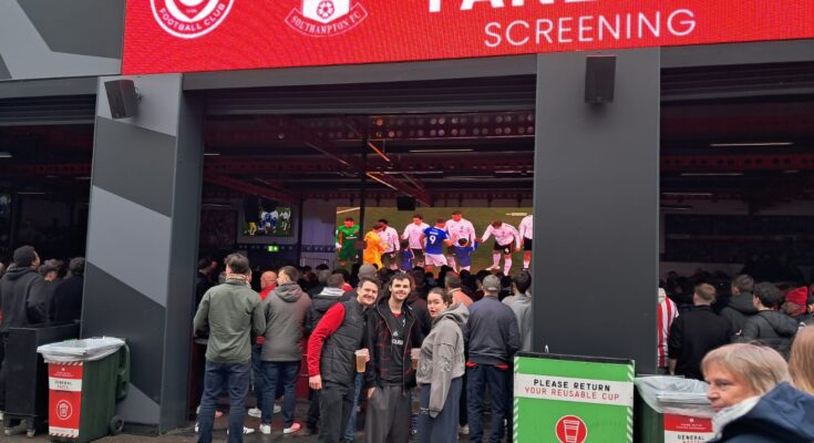 Fans congregate in the fan zone at St Marys