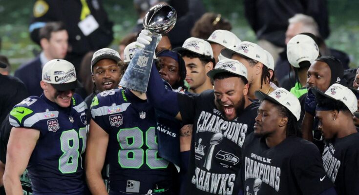 Seattle Seahawks lifting the Superbowl trophy