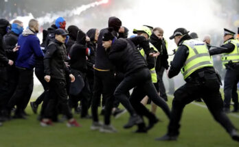 Police are trying to contain Rangers and Celtic fans