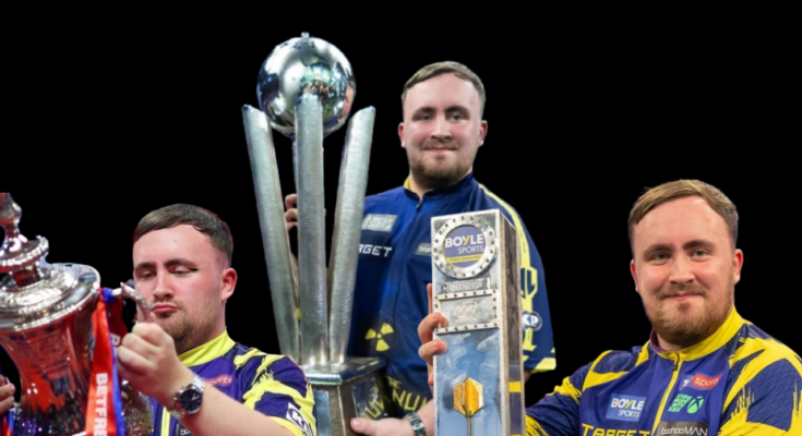 A Darts player in a purple and yellow shirt holding three trophies.