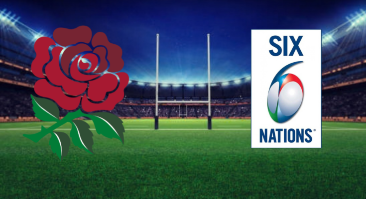 On the background of a rugby pitch, the badge of England's Rugby team lies opposite that of the Six Nations tournament.