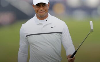 Tiger Woods holding a golf club