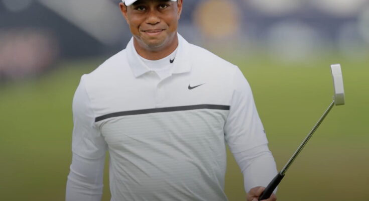 Tiger Woods holding a golf club