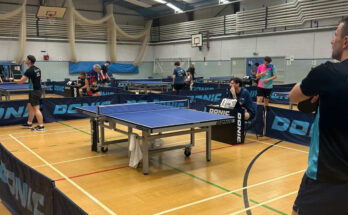 Table tennis courts during play in the veterans tournament