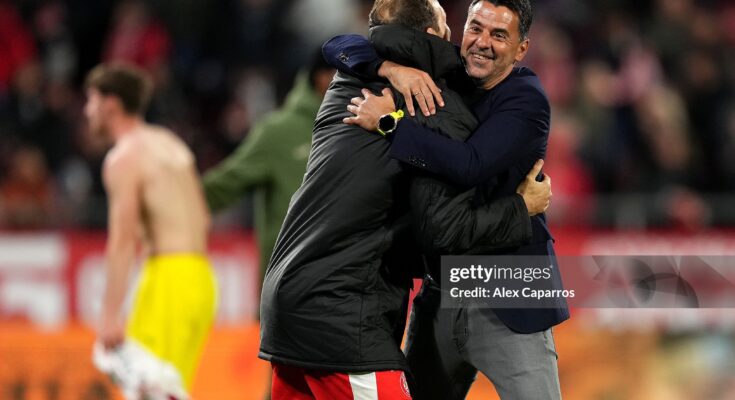 GIRONA, SPAIN - APRIL 06: Michel, Head Coach of Girona FC, celebrates victory with his player Daley Blind of Girona FC following the LaLiga EA Sports match between Girona FC and Villarreal CF at Montilivi Stadium on April 06, 2026 in Girona, Spain. (Photo by Alex Caparros/Getty Images)