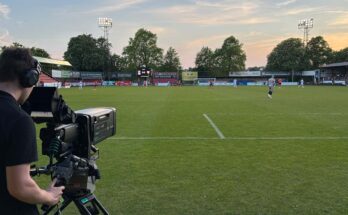 Camera points towards football pitch