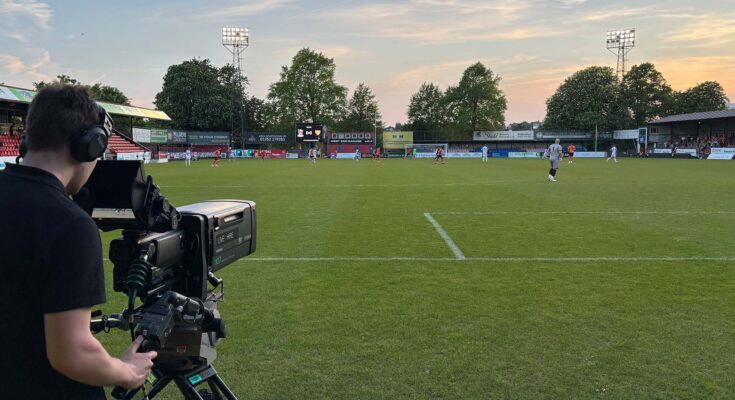 Camera points towards football pitch